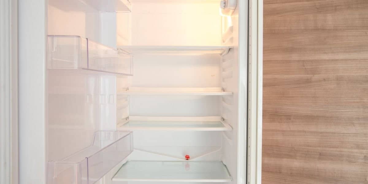 Remove Shelves and Drawers-How To Clean a Smelly Refrigerator